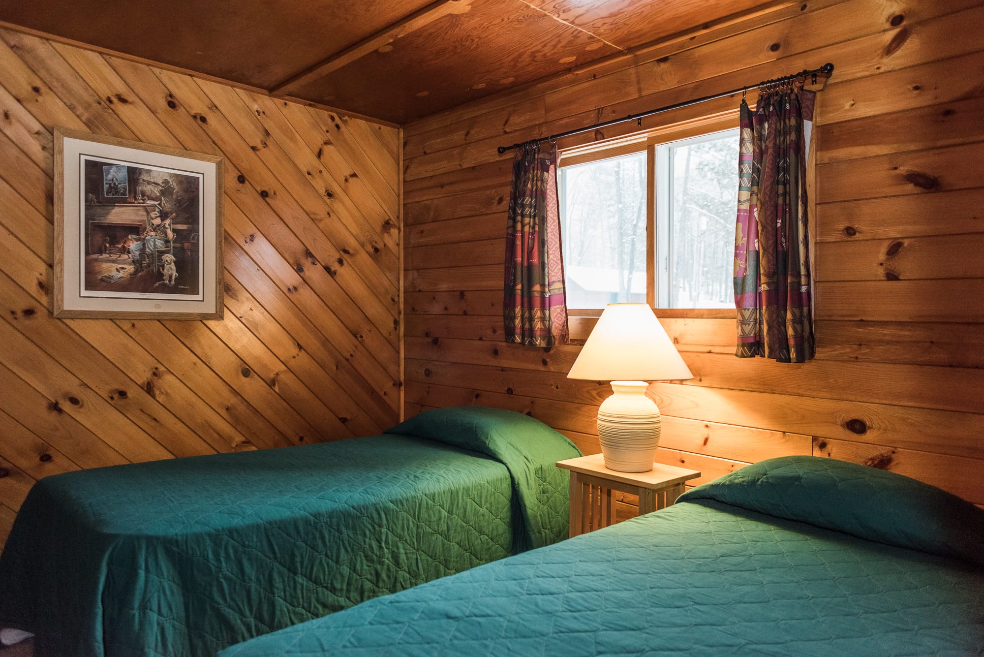 Clearview cabin bedroom with two single beds.