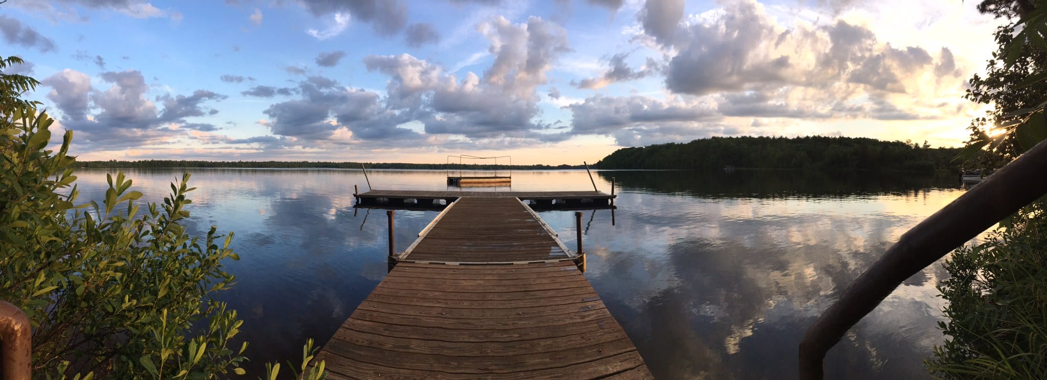 Lake dock at sunset.