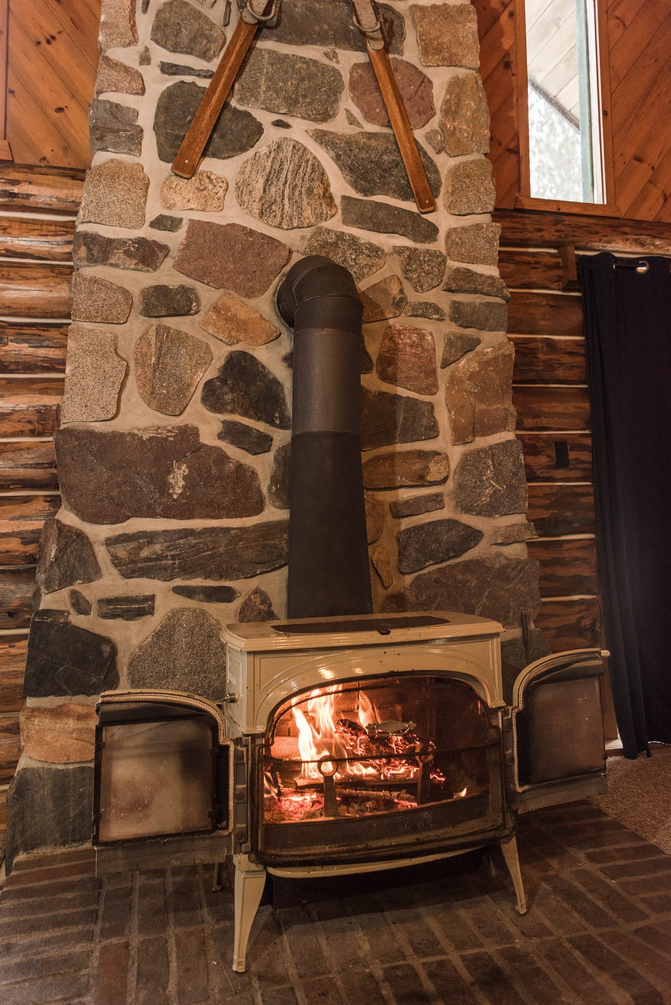 Lakeview cabin wood burning stove/fireplace.