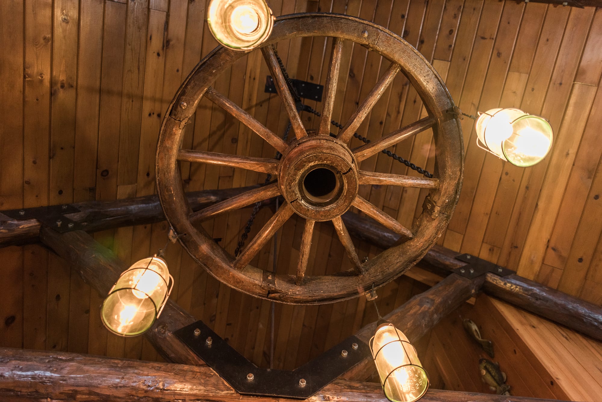 Lakeview cabin wagon wheel chandelier.