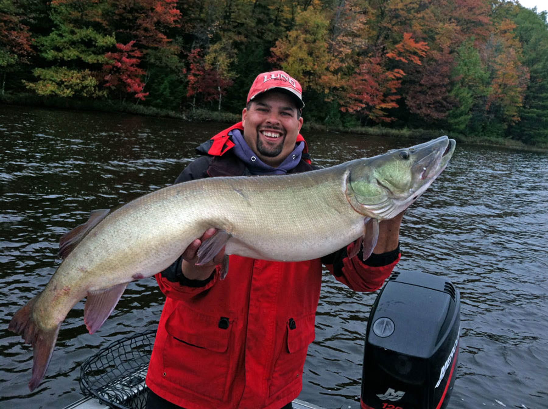 Man holding a Muskie.