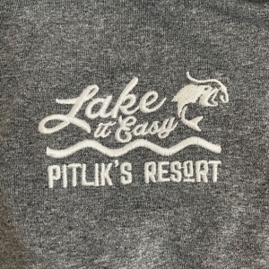 Grey Sport-Tek Pullover closeup of Pitlik's logo.